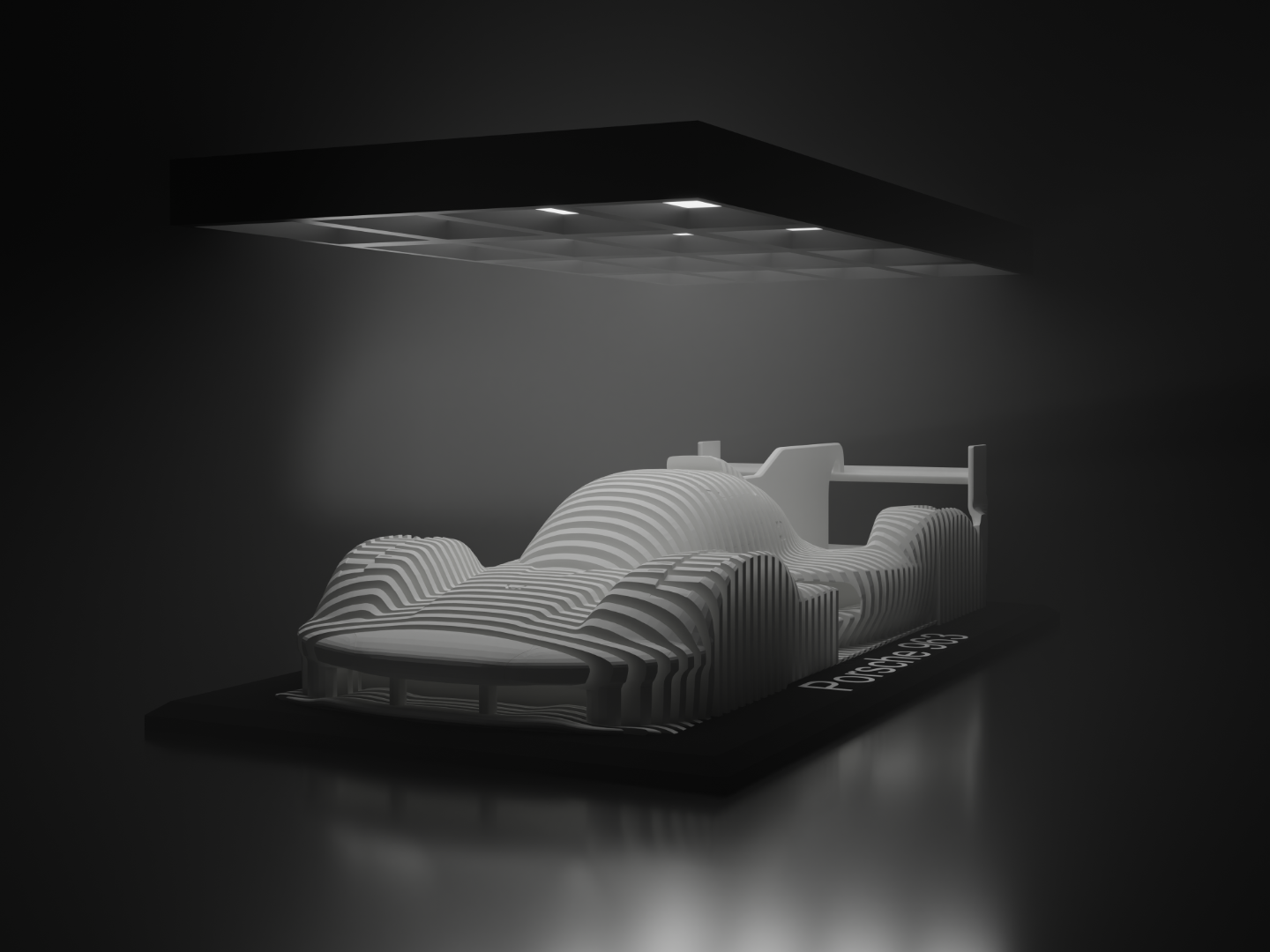 Porsche 963 réteges szobor